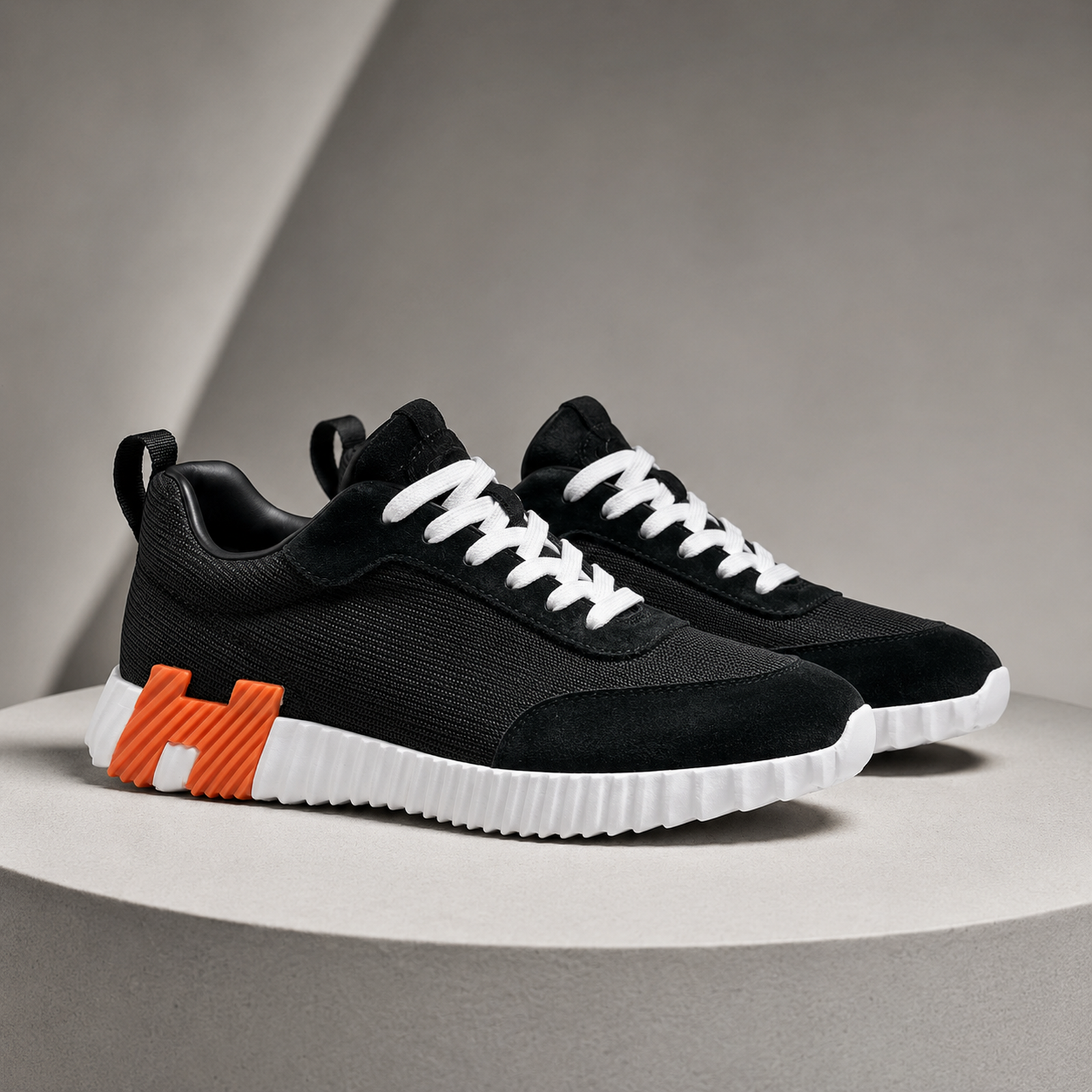 Hermes Bouncing Black Orange studio